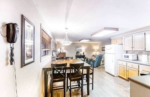 Joseph House | Riverfront ground-floor apartment with patio & lovely yard - dog-friendly