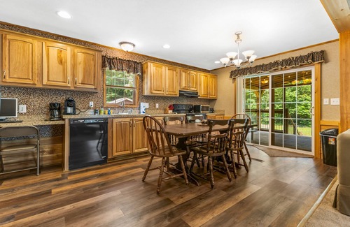 Schroon Lake House | Riverfront home with huge screened deck - dog-friendly, fireplace & fast WiFi