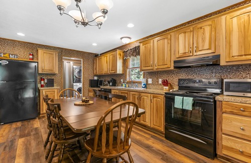 Schroon Lake House | Riverfront home with huge screened deck - dog-friendly, fireplace & fast WiFi