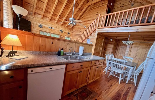 Choestoe Cabin | Riverfront Log Cabin with Hot Tub-Tubing on the River, Pet Friendly.