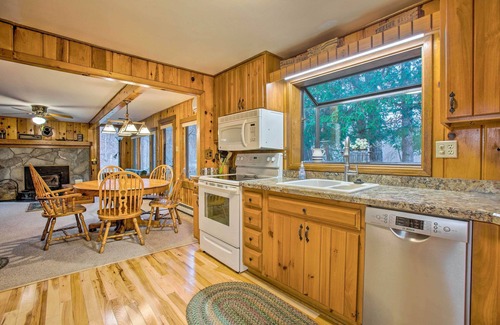 Manton Cabin | Riverfront Manton Cabin w/Pool Table & Fire Pit!
