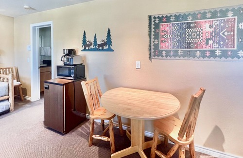 Grand Lake Condo | Riverfront retreat with a kitchenette, washer/dryer, & shared patio