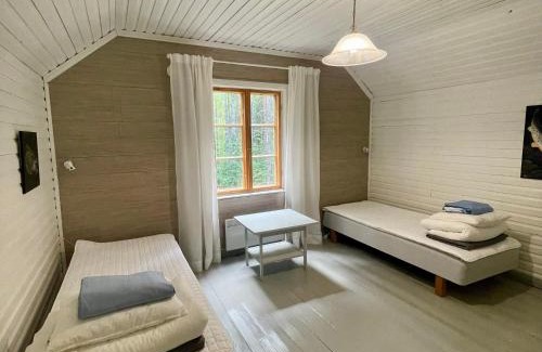 Mikkeli Apartment | Riverfront Retreat Willa Taimen with wooden sauna & wild nature