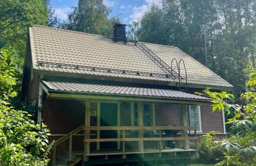 Mikkeli Apartment | Riverfront Retreat Willa Taimen with wooden sauna & wild nature