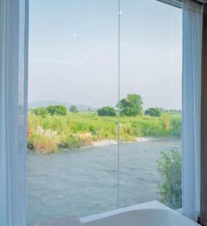 Mayapur Hotel | Riverside Bliss at Sukoon - A Riverside Retreat