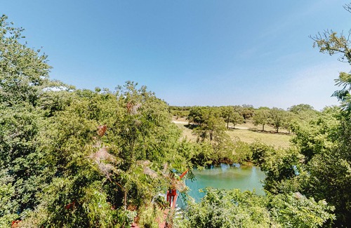 New Braunfels Condo | Riverside condo with pool and river access, washer/dryer, AC - snowbirds OK