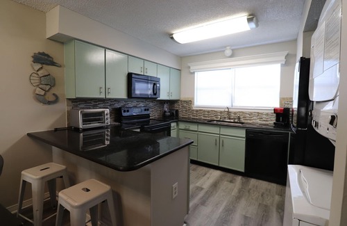 Orange Beach East Condo | Riverside Condo with access to beach and bay!