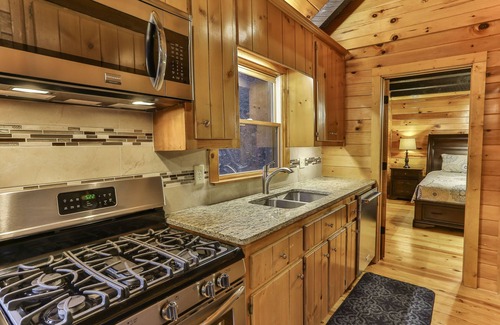 Ellijay Cabin | Riverside Elegance: Twin Luxury Lodges in Ellijay – Symphony of Nature & Comfort