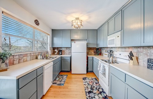Pedernales Bend House | Riverside escape with a scenic deck, grill, firepit & central AC - dog-friendly