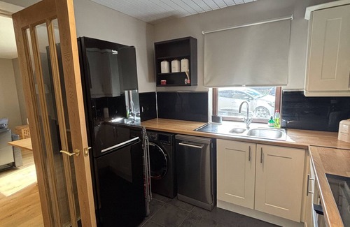 Tillicoultry Apartment | Riverside Rest - 2 bedroom apartment: sleeps 4 guests with private parking