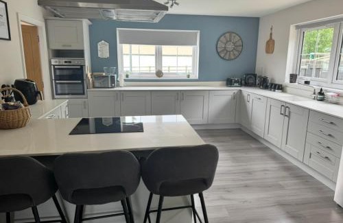 Wooler House | Riverside View - Large, modern 4 bedroom house with hot tub