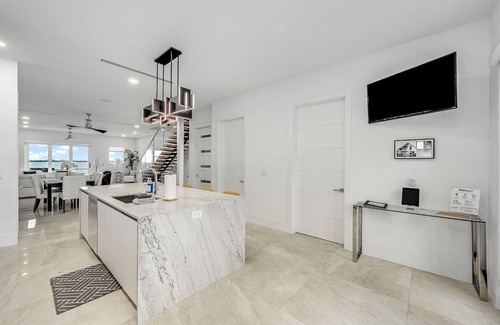 Melbourne House | Riverview Oasis- Riverfront Paradise with Dock, Elevator, Private Pool & Kayaks