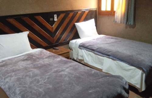 Figuig Bed & Breakfast | Riyad Zenaga offers rooms It has a shared kitchen, restaurant and terrace.