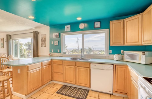 Roads End House | Roads End Ocean View Home Has Hot Tub, Second Living Area and Kids Playground!