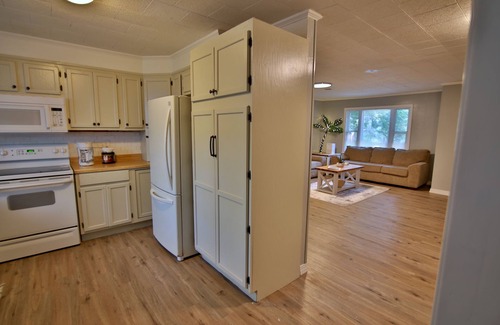 Thayer House | Rock House Retreat - 2 miles from Spring River! Walking distance to restaurants!