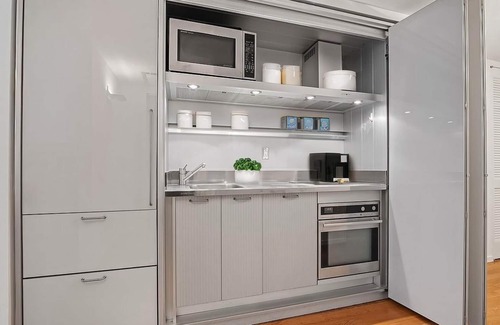 Central Park South Apartment | Rockefeller Center 1BR/1.5BA Luxury Condo