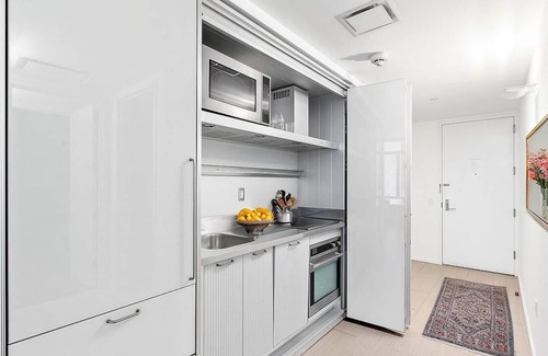 Central Park South Apartment | Rockefeller Center 1BR/1.5BA Luxury Condo