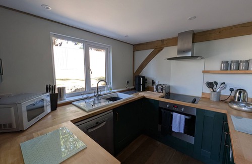 Holworth Cottage | ROMAN LODGE, pet friendly, with a garden in Osmington