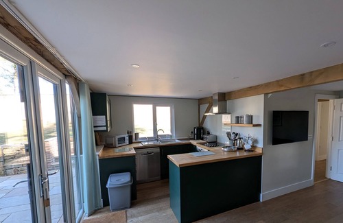 Holworth Cottage | ROMAN LODGE, pet friendly, with a garden in Osmington