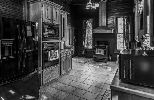Waller Ski Chalet | Romantic 1901 Victorian Home on Seven Wooded Acres
