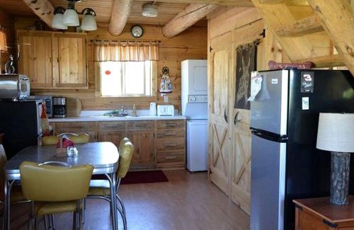 Whitehall House | Romantic Cabin Rental with a Delightful Porch near Ennis, Montana