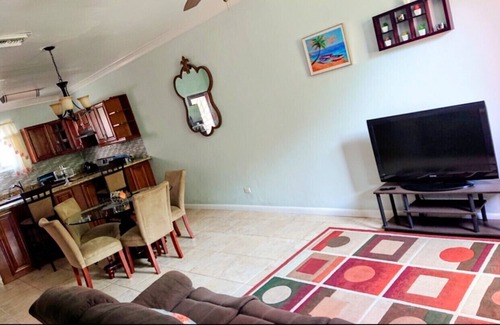 Coral Harbour House | Romantic Getaways or Family fun. Enjoy Island Vibes at 2BR Townhome Near Beach!
