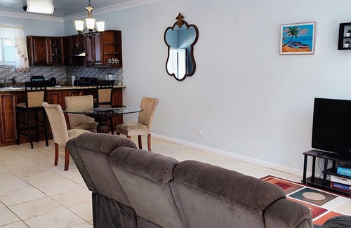 Coral Harbour House | Romantic Getaways or Family fun. Enjoy Island Vibes at 2BR Townhome Near Beach!