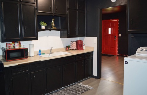 Amarillo House | Romantic Kink Loft for Couples King Bed, Naughty Playrooms, BDSM Vibes