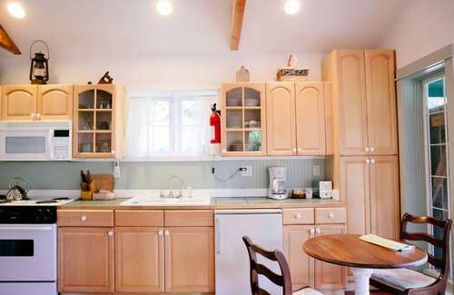Olga Cottage | Romantic Lummi Cottage, Secluded in the Trees with Water View & Beach Path