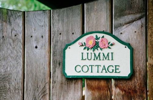 Olga Cottage | Romantic Lummi Cottage, Secluded in the Trees with Water View & Beach Path