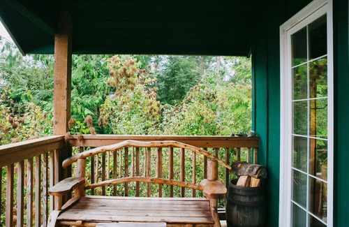 Olga Cottage | Romantic Lummi Cottage, Secluded in the Trees with Water View & Beach Path
