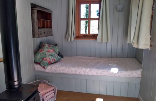Busserolles Cabin | Romantic riverfront shepherds' hut with outdoor kitchen w/firepit
