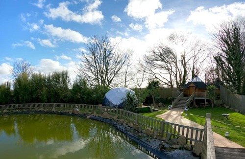 Camborne House | Romantic Treehouse with Hot Tub & BBQ Lodge
