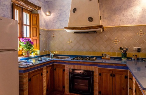 Guajar Faraguit House | Romatic Andalusian village house, solar-heated Jacuzzi cave pool