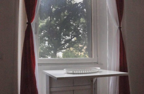 Rione XVIII Castro Pretorio Apartment | Rome: Sleeping space and living room - two levels between Repubbli