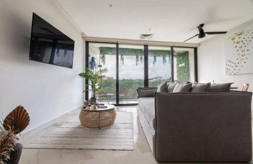 Gonzalo Guerrero Apartment | Rooftop Bliss, Steps from Playas Best Beach