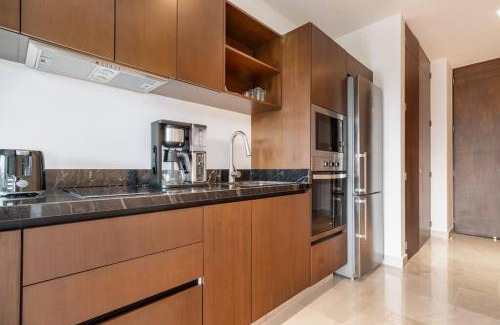 Gonzalo Guerrero Apartment | Rooftop Bliss, Steps from Playas Best Beach