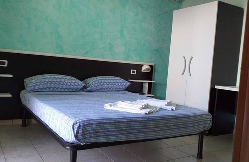 Pineto Bed & Breakfast | Room in B&B - Quadruple Room Just Steps From the sea - Ideal for a Relaxing Vacation
