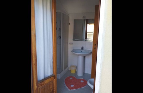 Pineto Bed & Breakfast | Room in B&B - Quadruple Room Just Steps From the sea - Ideal for a Relaxing Vacation