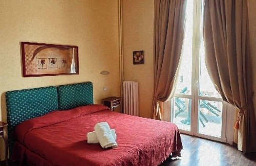 Viareggio House | Room in Guest Room - Fly in Viareggio Beach in Front of the Famous Promenade With Shops and Establishments