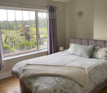 Portsalon House | Room with a double bed to rent