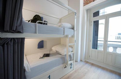 Justicia Hostel | room00 Gran Vía Hostel