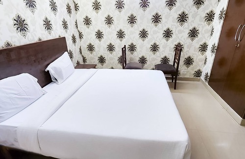 East of Kailash Hotel | Roomshala 019 Hotel JPM