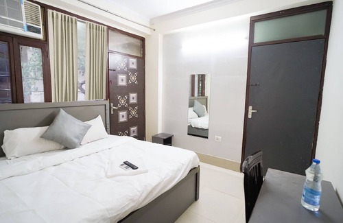 Sector 63 Hotel | Roomshala 034 Grihum Noida Sector 63