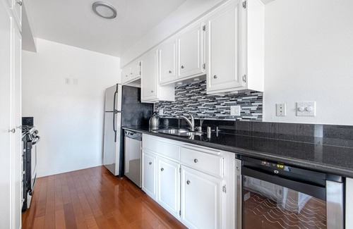 Sawtelle Apartment | Roomy Brentwood 2BR w/Gym + Courtyard, walk to Dining, by Blueground