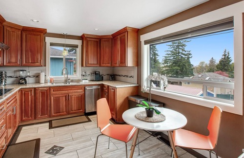 South Delridge House | Roomy, dog-friendly home with private hot tub, fireplaces, decks & living spaces