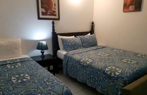 Negril Hotel | Roots Cafe Rooms