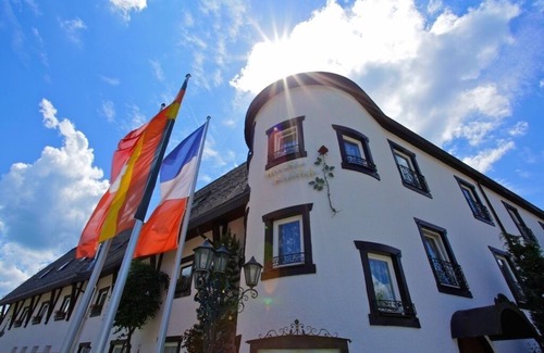 Schluchsee Apartment | Rose garden suite with shower/WC and balcony