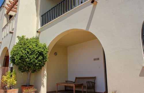 Costa Esuri Ski Chalet | ROU002 Townhouse with Private Garden and Direct Access to the Pool
