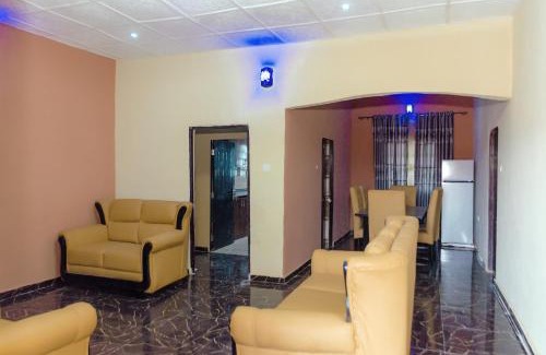 Benin City Apartment | Royal Guests Holiday Lets - A Modern 2-Bedroom Apartment with balcony, 24H CCTV, perfect for families, business or leisure